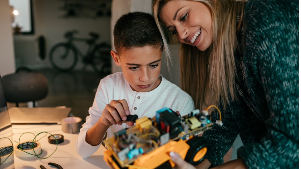 Mum building models with son
